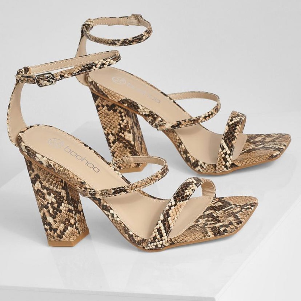 Snakeskin heels. New in box!